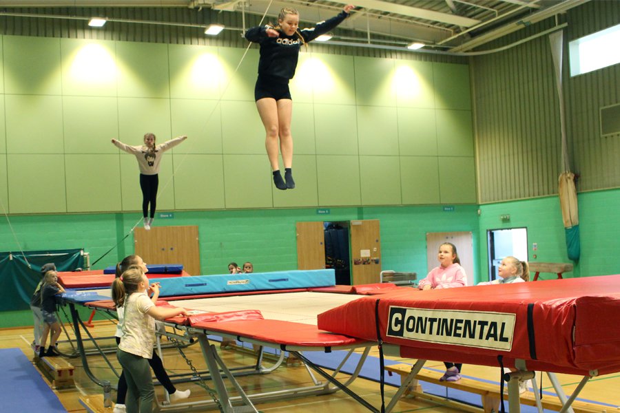 Children taking part in a trampoline session