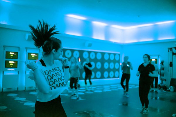 Instructor teaching Clubbercise class